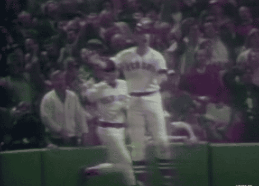 Iconic moment of Carlton Fisk celebrating his famous home run in 1975.